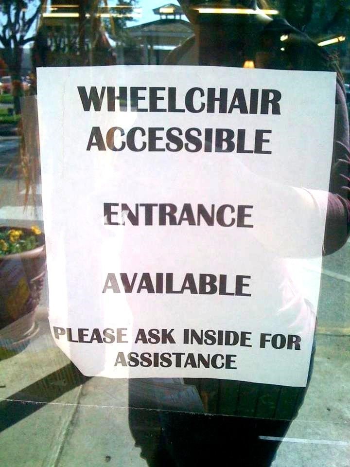 Sign on door: Wheelchair accessible entrance available. Please see inside for assistance